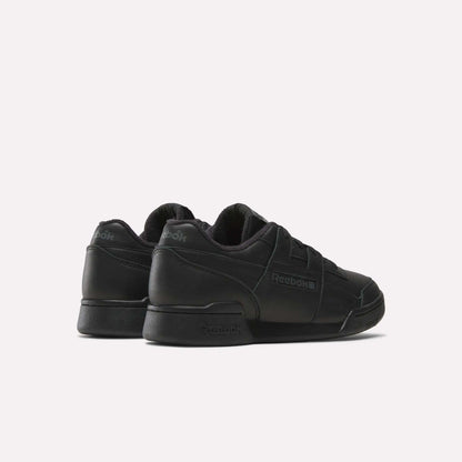 Step out in Reebok Workout Plus Shoes—classic black sneakers inspired by '80s fitness style, perfect for daily wear.