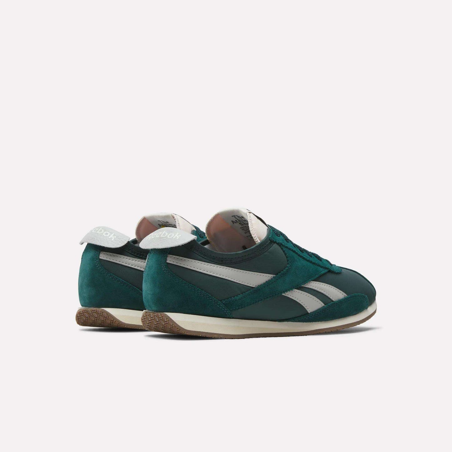 A pair of Reebok R400 Shoes in green with white accents and gum soles, placed side by side at an angle on a plain white background.