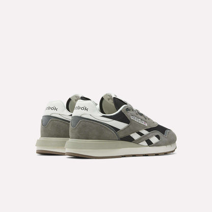 A pair of Reebok Classic Nylon 89 Shoes in gray, black, and white are displayed on a plain white background, angled with the heels forward and toes outward.
