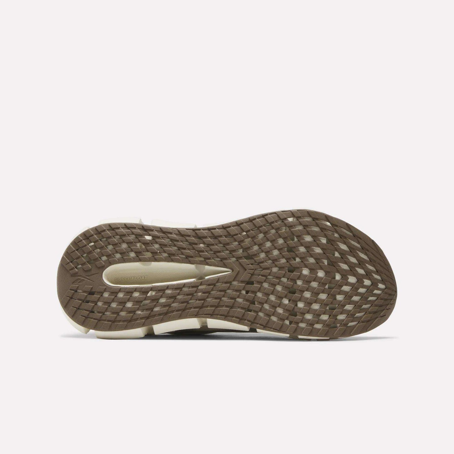 Bottom view of Reebok Men's FloatZig 2 Running Shoes, featuring a textured brown rubber sole with grid-like tread, beige arch inset, and Superfloat+ cushioning. Displayed against a plain white background.