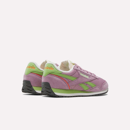 A pair of Women's Classic AZ Shoes by Reebok, featuring purple suede, green and red accents, white midsoles, black outsoles, and green Reebok branding on the heel—showcasing retro running style against a plain white background.