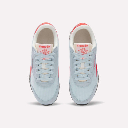 A pair of Women's Classic AZ Shoes by Reebok seen from above, with light blue uppers, white laces, beige interiors, and bright pink Reebok logos—retro running-inspired style with fresh pops of color.