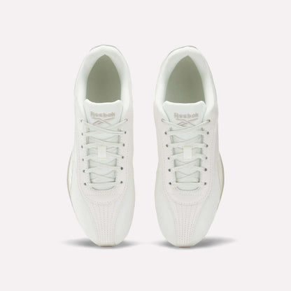 Top view of Women's Ultra Lo Shoes by Reebok in white, featuring white laces and Reebok branding on the tongues. The low-profile, minimalist shoes are placed side by side on a plain white background.