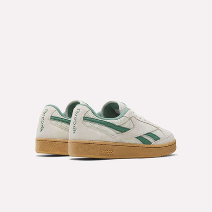 The Reebok Club C Grounds 70 Shoes in white with green accents and gum soles, made from premium suede, are displayed side by side on a white background, evoking subtle '70s inspiration.