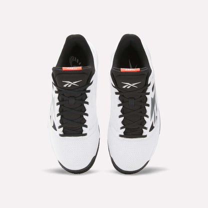A pair of Reebok Engine LT Shoes in white with black laces, tongue, and detailing is shown from above on a light background. The Reebok logo appears on each shoe's tongue.