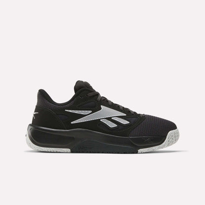 Reebok Engine LT Shoes are black and white low-cut athletic sneakers with a mesh toe, patterned outsole, white side logo and detailing, plus a light gray sole designed for superior grip.