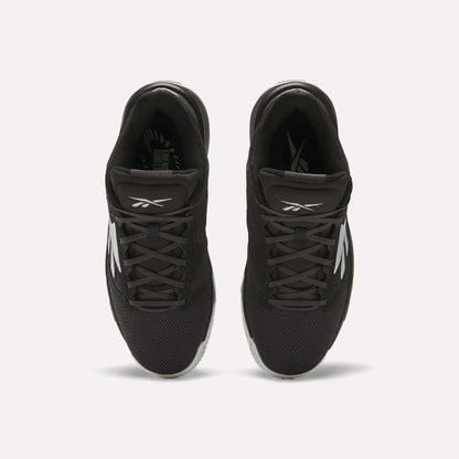 Top view of a pair of Reebok Engine LT Shoes in black with white logos and accents, featuring mesh uppers and black laces, placed side by side on a white background.
