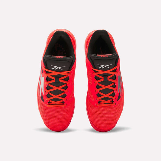 Top view of a pair of Reebok Engine LT Shoes in bright red with black interiors, black and red tongues, and black side detailing, displayed on a plain white background.