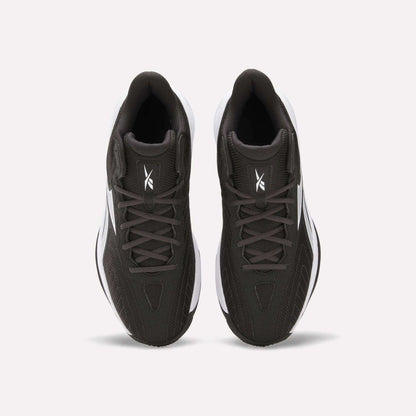 Top view of Reebok Press Basketball Shoes in black with white soles and logo on the tongue, shown side by side on a white background. These shoes offer responsive comfort with EVA cushioning.