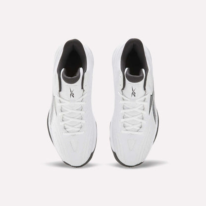 A pair of Reebok Press Basketball Shoes in white with black accents, seen from above on a white background. These sneakers feature laces, a branded tongue, and EVA cushioning inspired by classic basketball heritage.