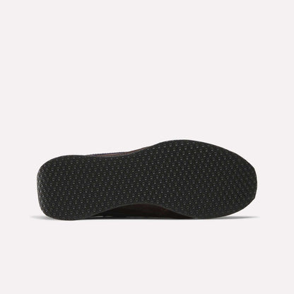 The image shows the bottom view of a Reebok Camargue x C.F. Stead Shoes sole, featuring a black hexagonal textured pattern on a white background—a durable archival style frequently combined with premium full-grain leather uppers.