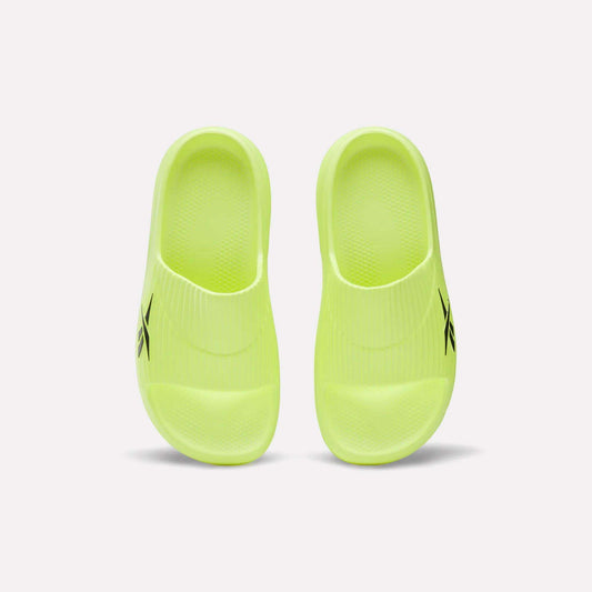 A pair of neon yellow Reebok DMX Recovery Walking Slides with textured footbeds, moving air cushioning, and a black logo on the side, shown from above on a white background.