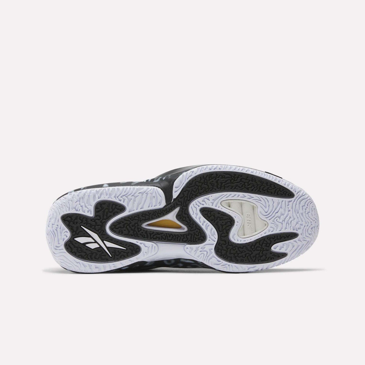 The image shows the sole of the Reebok Engine A 26 Basketball Shoes, with a wavy black and white pattern, textured grip, and a gold accent near the midfoot. The Reebok logo highlights their lightweight support for peak performance.