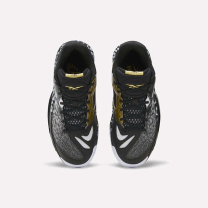 Top view of a pair of Reebok Engine A 26 Basketball Shoes in black with white and gold accents, featuring patterned toe and side panels, white outsoles, and ERS+ System cushioning for game-changing comfort.