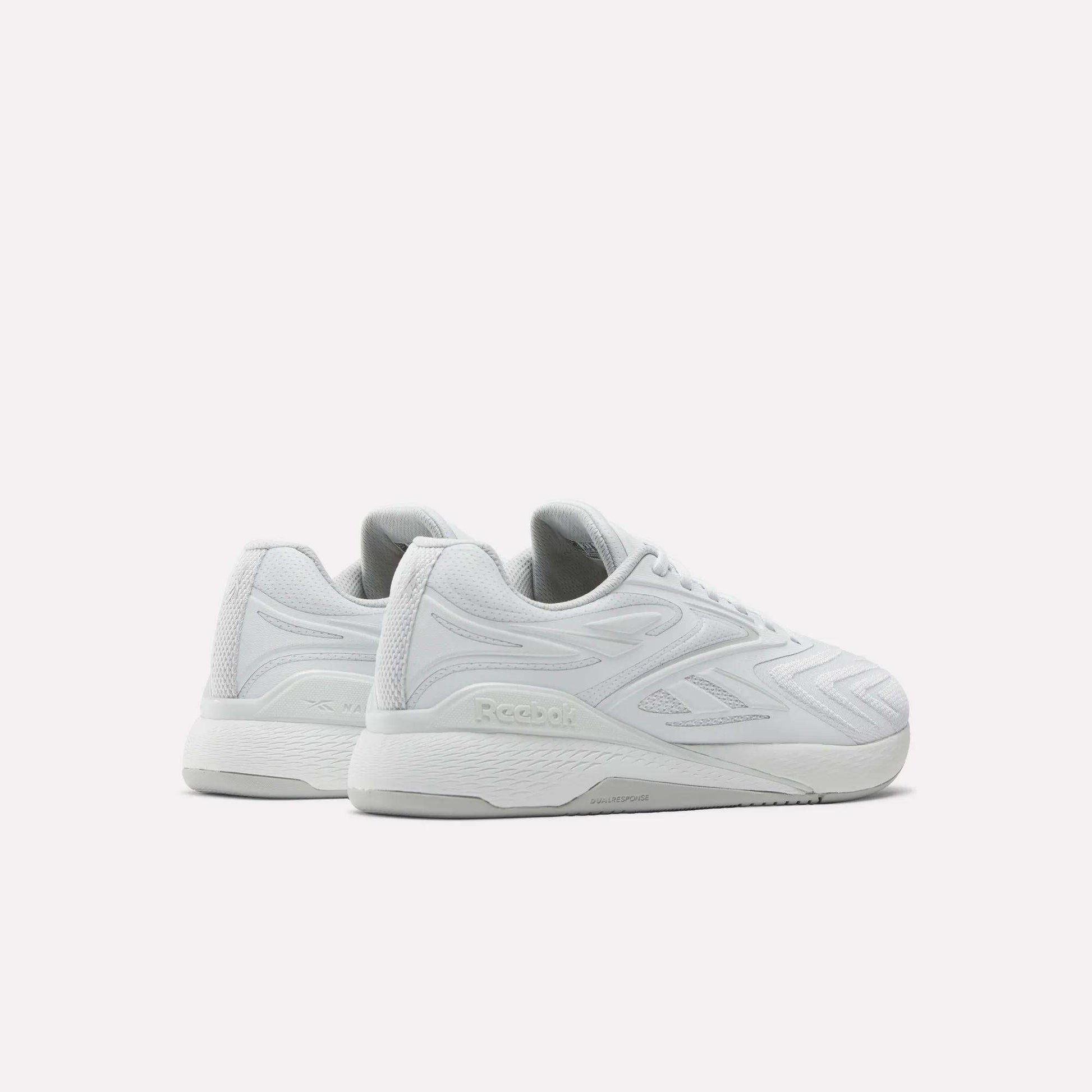 A pair of white Reebok Nano X5 Edge Training Shoes with textured side panels and a chunky sole, designed for precision training, are positioned side by side facing left on a plain white background.