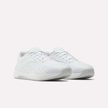 A pair of Reebok Nano X5 Edge Training Shoes in white, featuring Flexweave texture, thick soles, and subtle branding on the heel and side, displayed against a plain white background.
