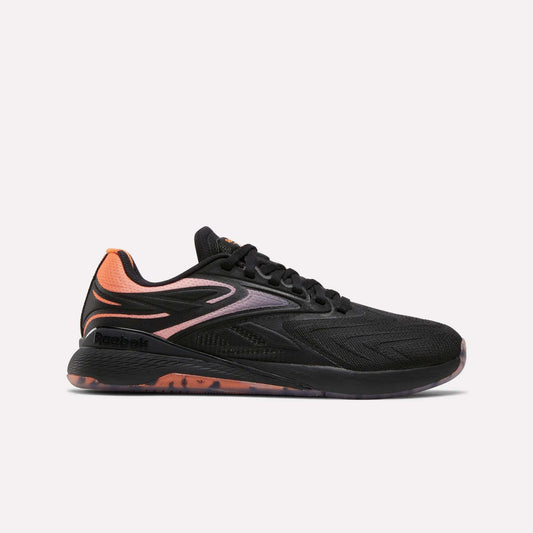 A side view of the Reebok Women's Nano X5 Edge Training Shoes in black with orange heel and sole accents, featuring a sleek lace-up design, set against a plain light background.