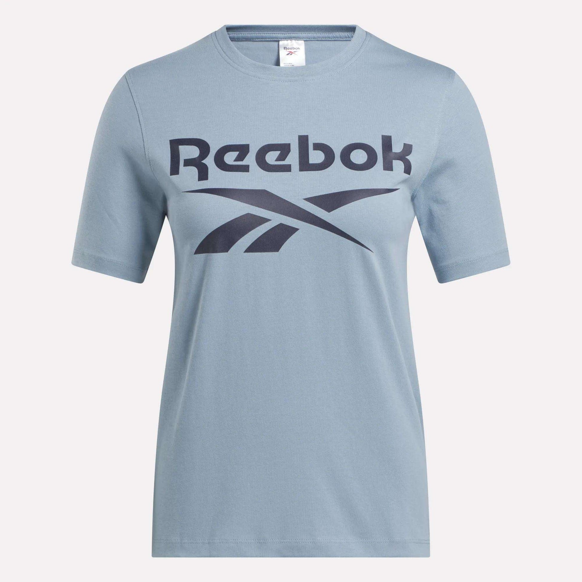 The Reebok Women's Big Logo Crewneck Short Sleeve Tee is a soft cotton jersey t-shirt with a stylish front logo.