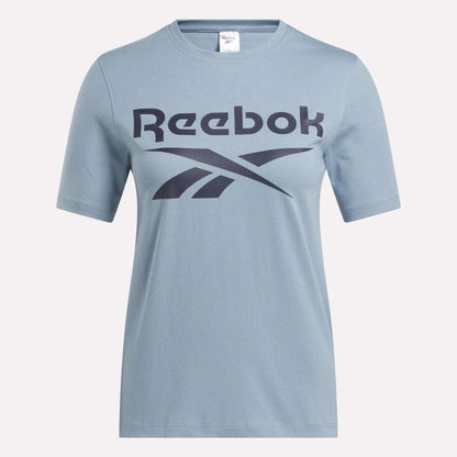 The Reebok Women's Big Logo Crewneck Short Sleeve Tee is a soft cotton jersey t-shirt with a stylish front logo.