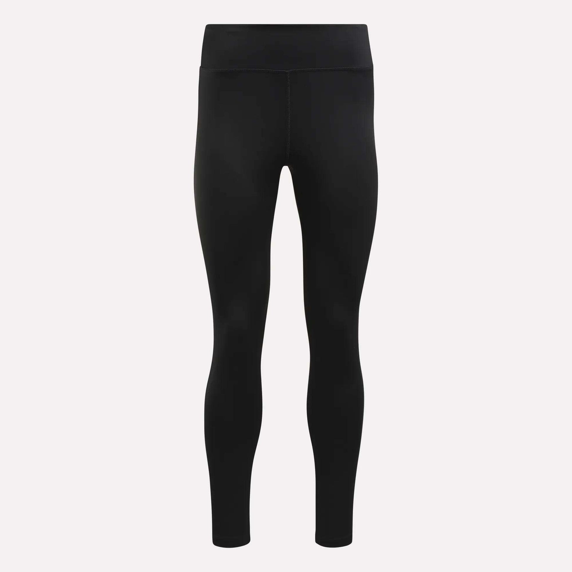 Black, full-length Women's Lux High-Rise Tights from Reebok, featuring RBK-DRY performance fabric and a seamless, smooth texture. These high-waisted training leggings are shown on a plain white background with no visible logos or patterns.