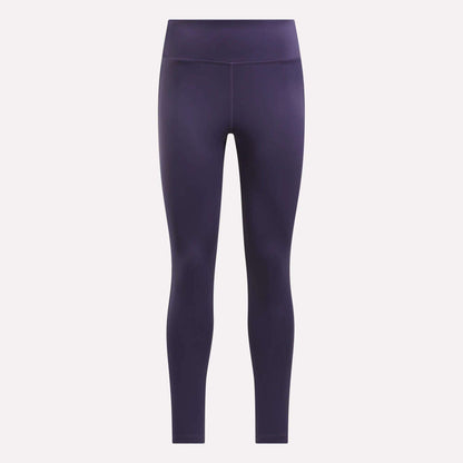 Reebok Women's Lux High-Rise Tights in purple, made with RBK-DRY performance fabric, are shown full-length against a plain light background.