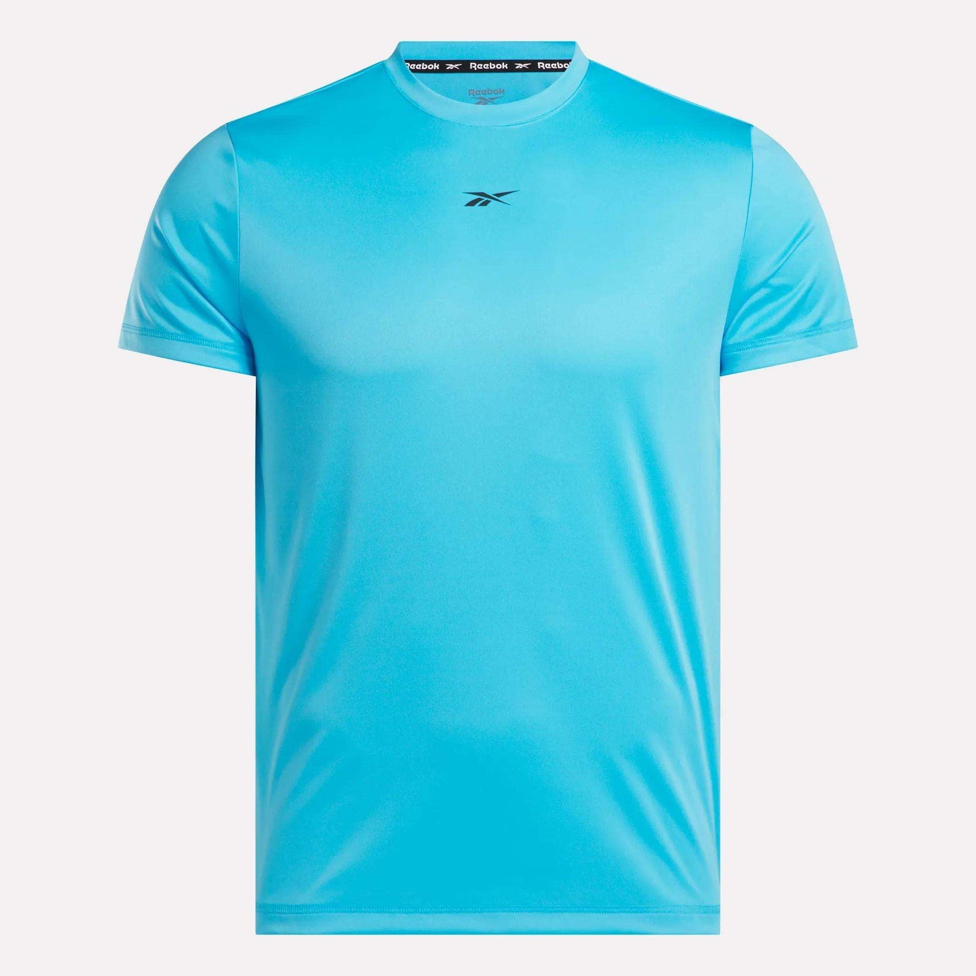 The Reebok Men's ID Train Short Sleeve Tech Tee is a bright blue gym shirt with short sleeves and a small black logo on the chest, made from RBK-DRY fabric. Displayed on a white background.