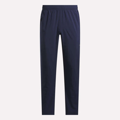 Blue Reebok Men's Train Woven Unlined Pants, ideal as lightweight workout pants.