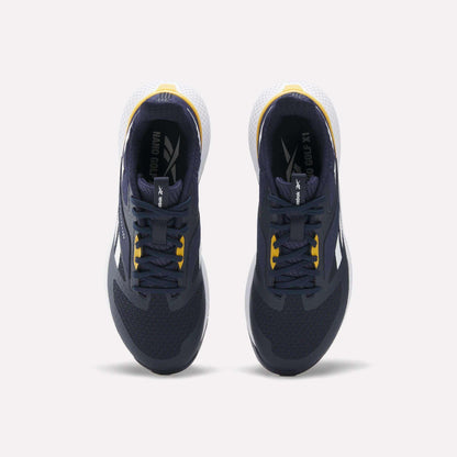Top view of a pair of Reebok Nano Golf Shoes in dark navy with yellow accents, featuring a lightweight FlexWeave upper, white heel detail, and white outsole, placed side by side on a light background.