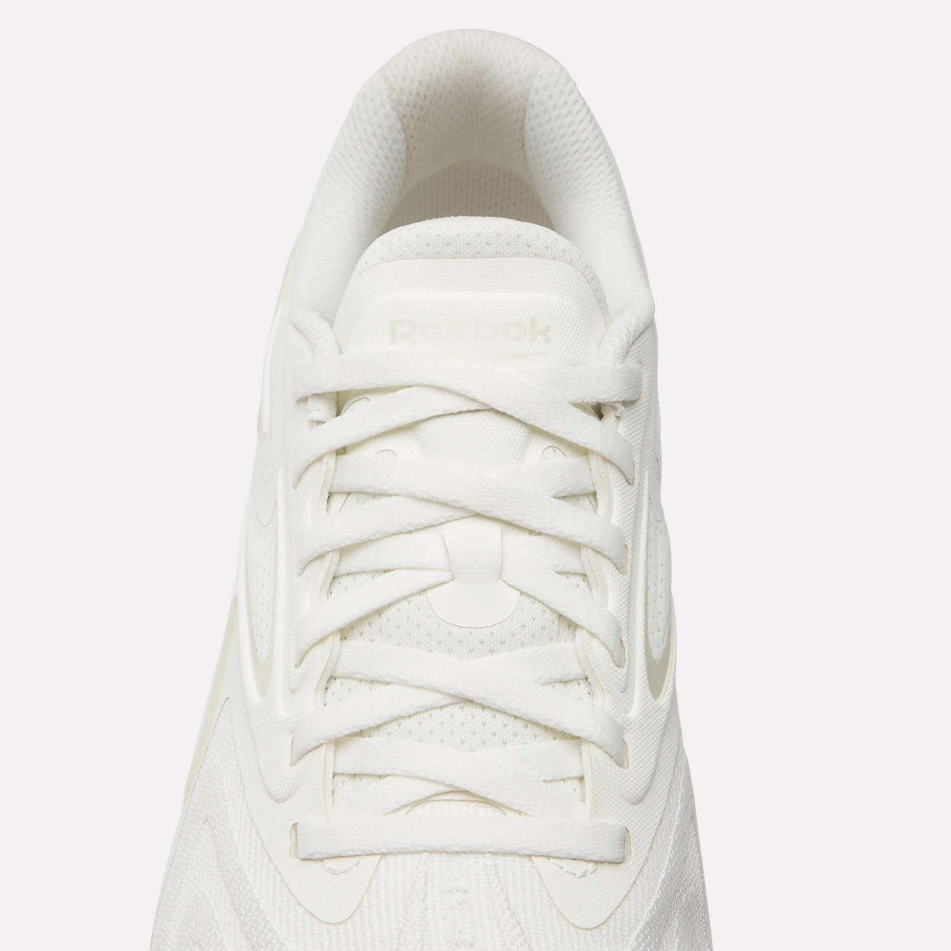 Top view of the Reebok Nano X5 Edge Training Shoes in white with white laces, a textured upper, and a subtle Reebok logo on the tongue—engineered for performance-driven training sessions.