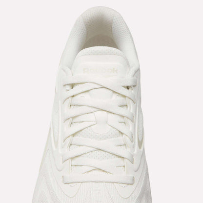 Top view of the Reebok Nano X5 Edge Training Shoes in white with white laces, a textured upper, and a subtle Reebok logo on the tongue—engineered for performance-driven training sessions.