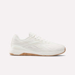 The Reebok Nano X5 Edge Training Shoes feature a white textured upper, white laces, and a light brown rubber sole, designed for performance training and displayed in a side profile on a plain white background.