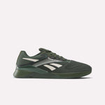 The Reebok Nano X4 Training Shoes, shown in side profile on a light background, feature a dark green mesh upper, white logo and accents, lace-up closure, and a textured rubber sole with Floatride Energy Foam.