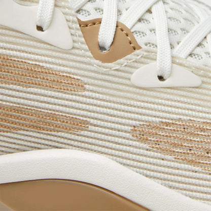 Close-up of the Reebok Engine A 26 Basketball Shoes, showcasing cream and beige striped fabric, white laces, beige and white eyelets, a tan accent near the laces, and textured details inspired by classic basketball shoes.