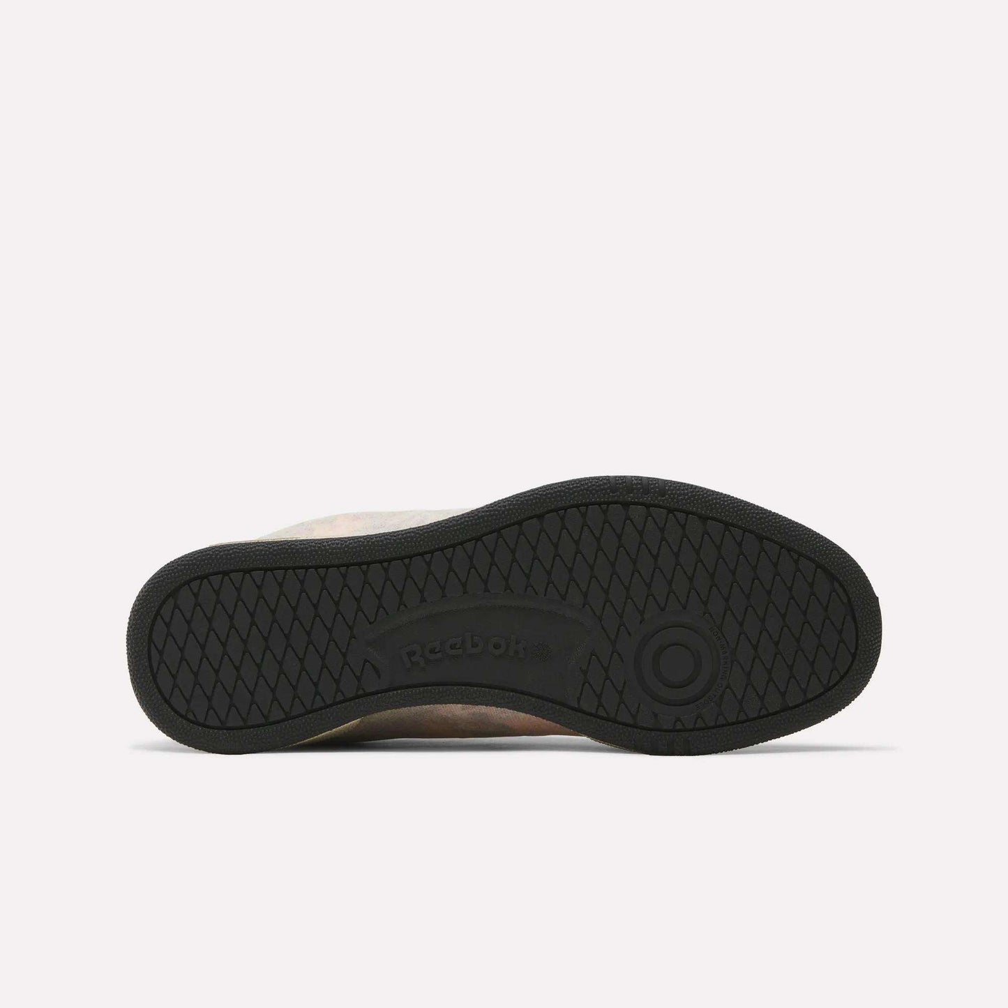 The image shows the black rubber sole of Reebok x MARKET Club C 85 Shoes, featuring a diamond-patterned tread and central Reebok branding. The sneaker lies on its side with the sole facing up.