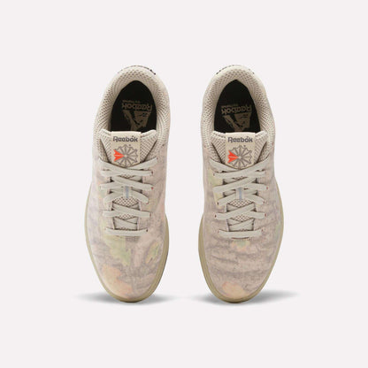 Top view of Reebok x MARKET Club C 85 Shoes in beige, featuring subtle pastel patterns, white laces, black insoles with the Reebok logo, and a red logo patch on each tongue. Court-inspired style with unique MARKET detailing.