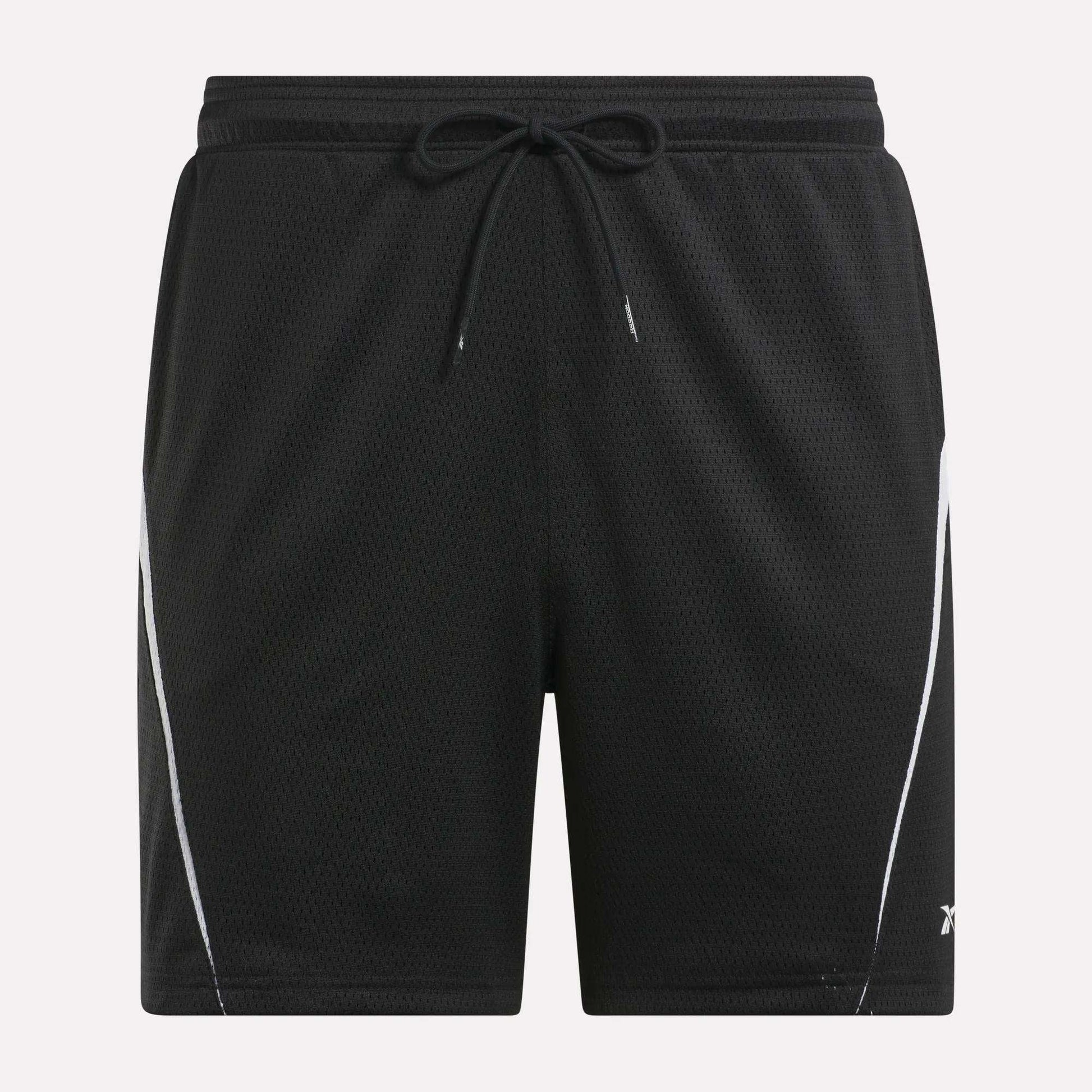 Reebok Mesh Shorts feature an elastic waistband, drawstring, and white diagonal side stripes. Made from lightweight, breathable mesh, they're perfect for sports or casual wear.