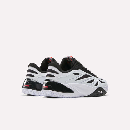 Two Reebok Angel Reese 1 Basketball Shoes in black, white, and red are shown on a white background, featuring the Reebok logo and Energy Return System—perfect for those seeking performance basketball shoes inspired by Angel Reese.