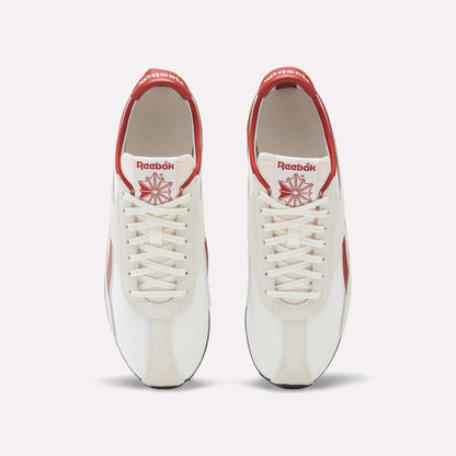 Top view of a pair of Reebok R400 Shoes in white with red accents, featuring white laces and red Reebok logos on the tongue and heel. These vintage Reebok sneakers are placed side by side on a plain background.