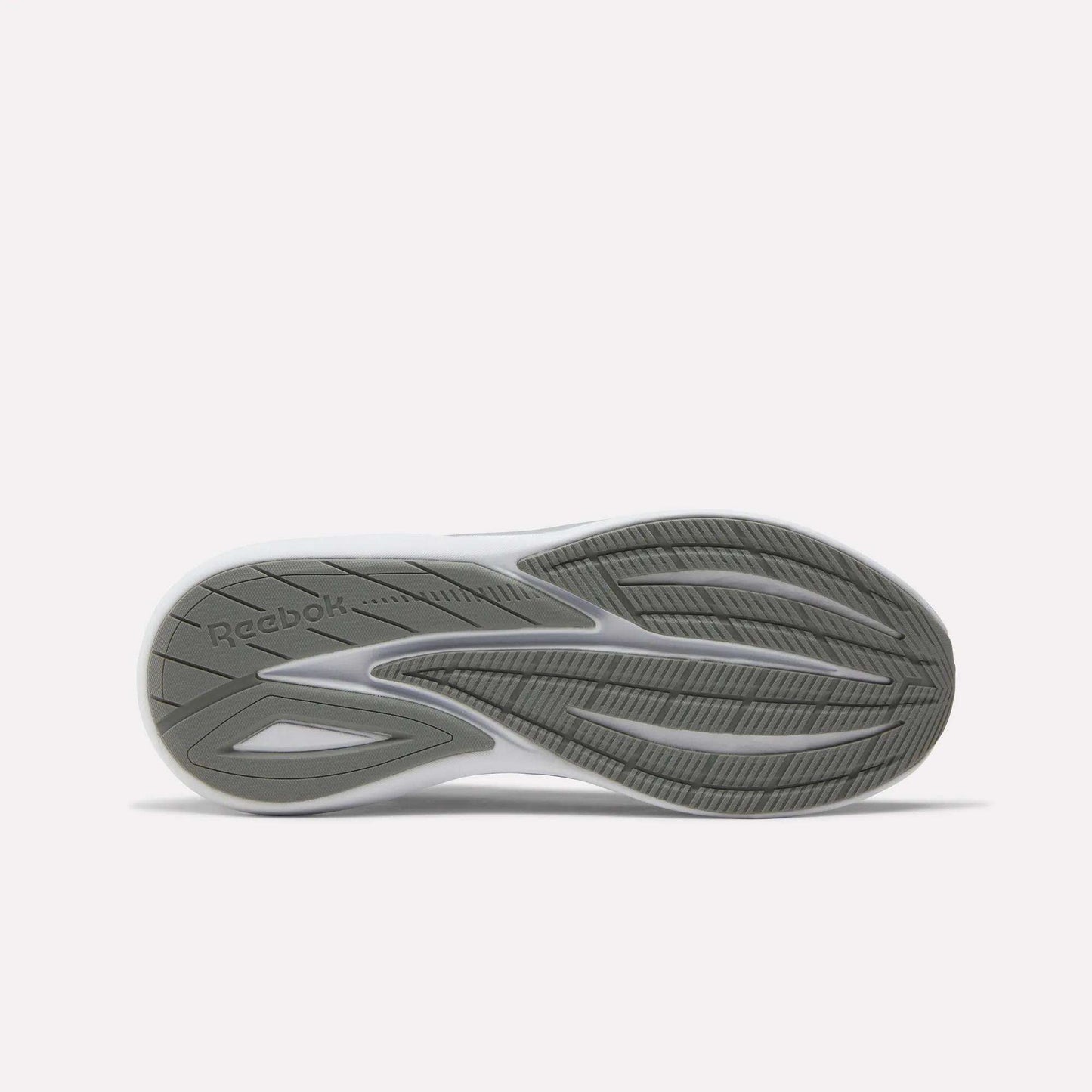 The image displays the sole of the Reebok Men's Viva Speed Shoes, featuring a grey and white pattern, textured grooves for added cushioning, enhanced grip and traction, and the Reebok logo embossed on the left side.