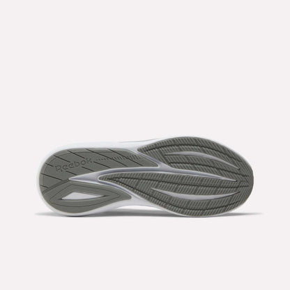 The image displays the sole of the Reebok Men's Viva Speed Shoes, featuring a grey and white pattern, textured grooves for added cushioning, enhanced grip and traction, and the Reebok logo embossed on the left side.