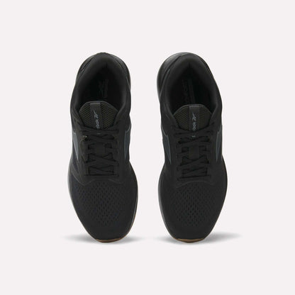 A pair of black Reebok Men's Nanoflex Trainer 2 Shoes viewed from above on a white background, featuring black laces, mesh uppers, and subtle Reebok branding on the tongue and side.