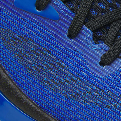 Close-up of the Reebok Engine A 26 Basketball Shoes shows a vibrant blue mesh upper, black laces, and textured details that highlight material and stitching patterns for enhanced stability and support on the court.