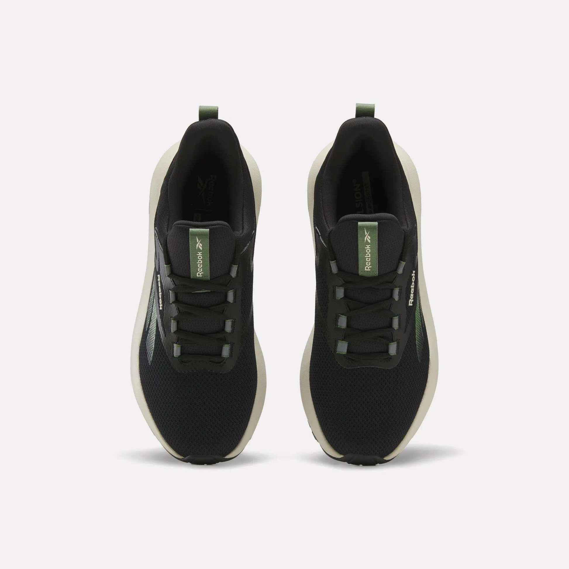 A top view of Reebok Men's Cityride 2 Running Shoes in black with white soles, green accents, and FuelFoam cushioning, highlighting the laces and Reebok logo on the tongue.