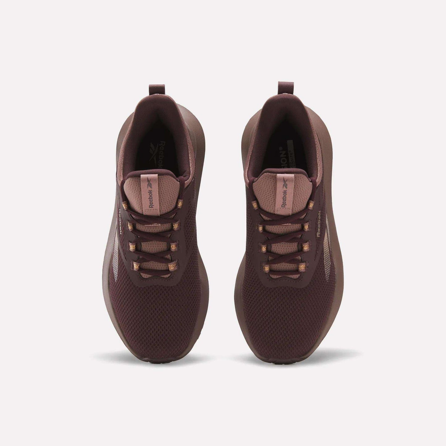 A pair of maroon Reebok Women's Cityride 2 Running Shoes shown from above, with mesh uppers, matching laces, subtle side and tongue logos, and FuelFoam cushioning, displayed against a plain white background.