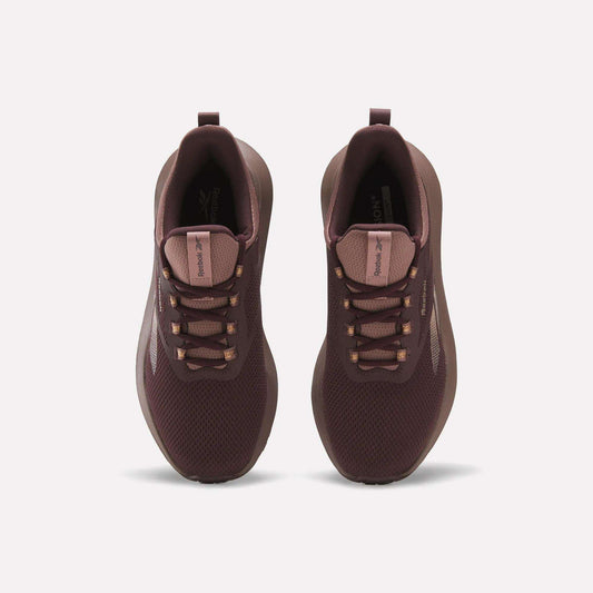A pair of maroon Reebok Women's Cityride 2 Running Shoes shown from above, with mesh uppers, matching laces, subtle side and tongue logos, and FuelFoam cushioning, displayed against a plain white background.