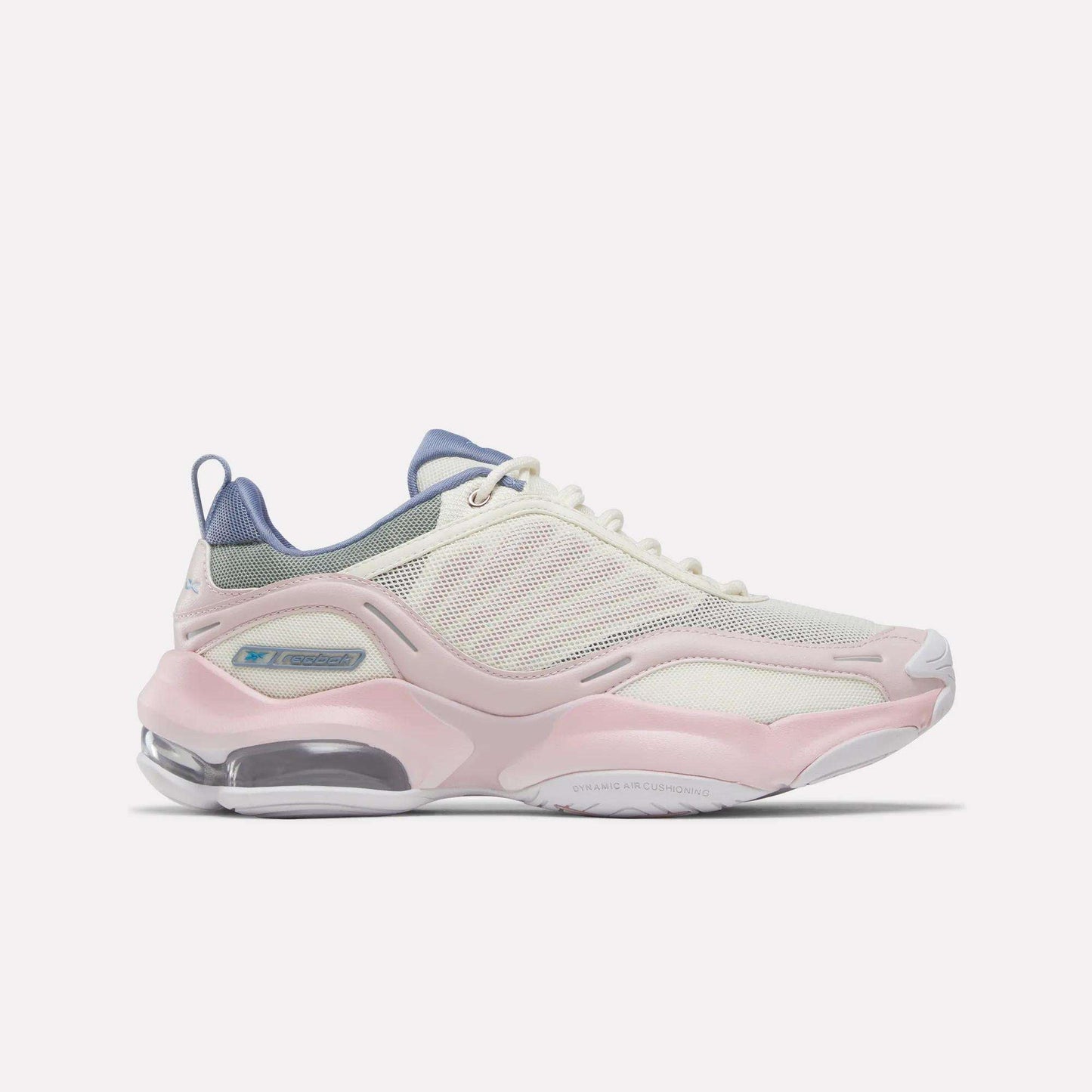 Step out in style and comfort with the Reebok Women's DMX Series 3000 Training Shoes, featuring a breathable white mesh upper highlighted by elemental pink and legacy green accents, plus a chunky sole with transparent heel sections. These standout sneakers incorporate advanced DMX 3 Technology for a responsive stride—perfect for those seeking cushioned shoes that combine eye-catching design with lasting comfort.