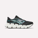 The Reebok Men's FloatZig 2 Running Shoes feature a black athletic design with teal accents and a thick, segmented white sole for energy-returning cushioning, shown in side profile against a plain light background.