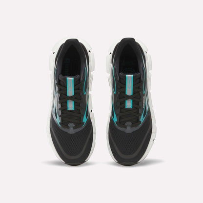A pair of Men's FloatZig 2 Running Shoes by Reebok, black with white soles and turquoise accents, featuring Superfloat+ cushioning, shown side by side from above on a plain white background.