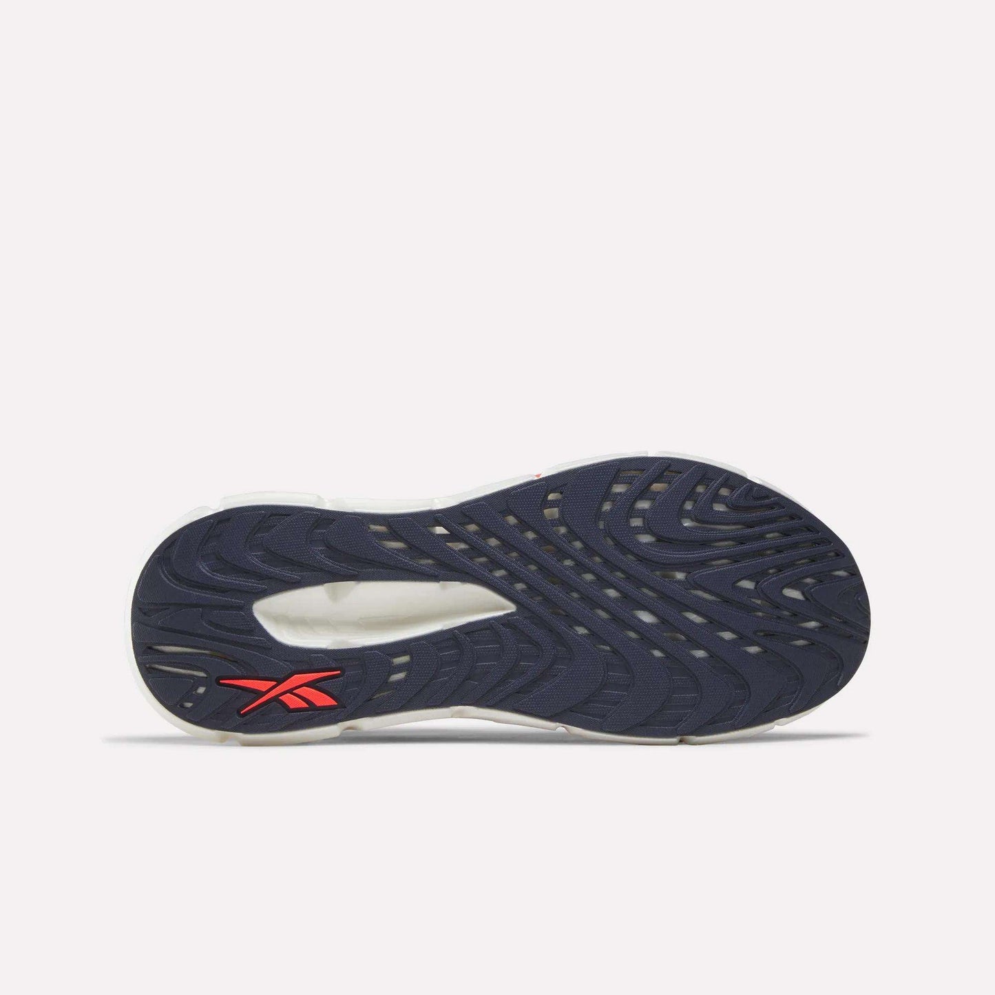 The image shows the sole of the Reebok Men's FloatZig Double Running Shoes, featuring a navy blue wavy tread and a red Reebok logo by the heel. Designed with StableStack, this max-cushioned shoe provides support and comfort for long runs.