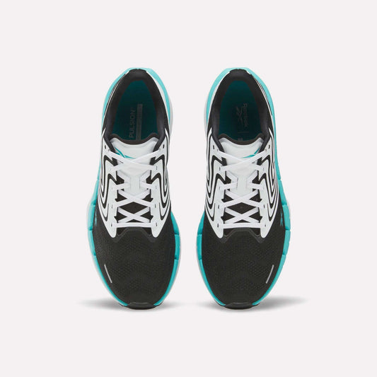 A pair of black Reebok Men's FloatZig Tread Running Shoes with white and teal accents, seen from above, highlights laces and a cushioned midsole—ideal for treadmill workouts against a plain white background.